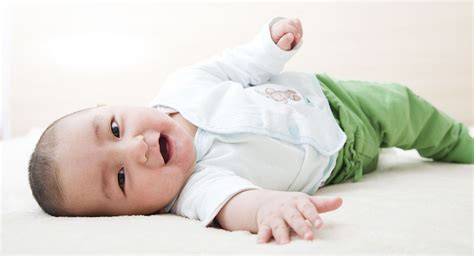 When do babies roll over? | BabyCentre