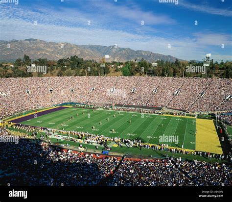 Football field with crowd in stadium Stock Photo - Alamy