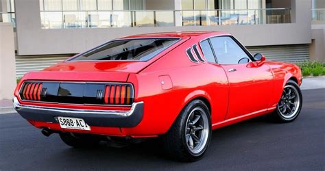 1970's Toyota Celica perfectly done. Simple red body drop and nice wheels. #Toyotaclassiccars ...