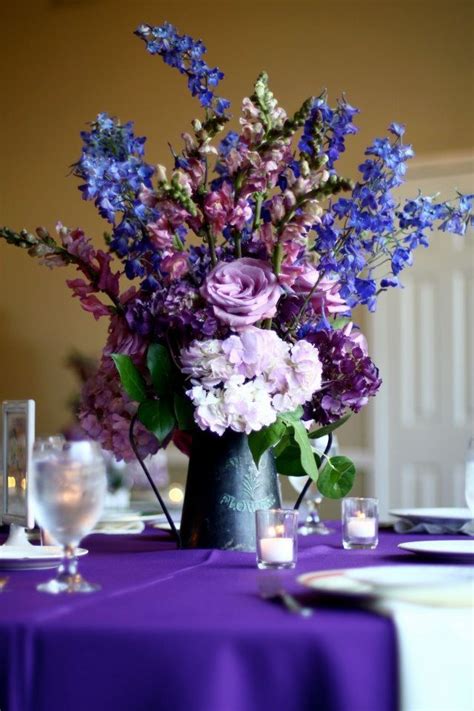 Pin by Andrea Larson on 9/7/19 | Wedding table flowers, Purple wedding centerpieces, Vintage ...