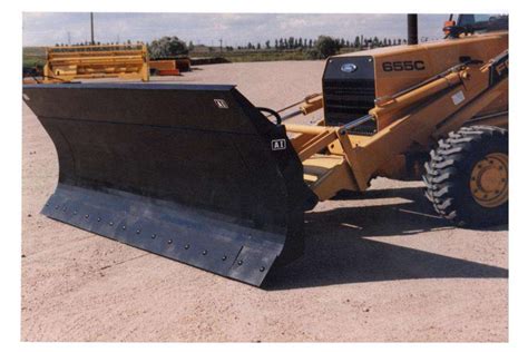 Backhoe Attachments Buyers Guide | All You Need To Know - Tires & Trax