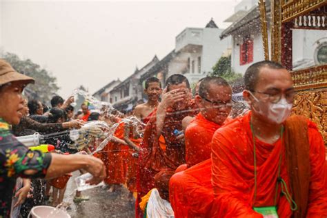 Laos celebrates new year in full tilt with pandemic precautions aside