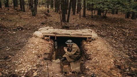 Building dugout survival shelter - Bushcraft log roof, sandbags | ww2 style - YouTube