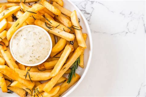 Premium Photo | French fries with sauce