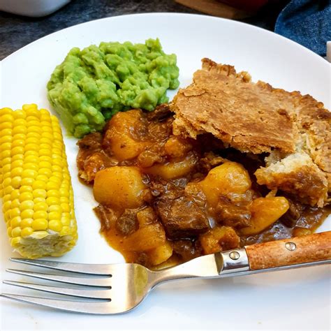 Traditional British meat and potato pie with suet pastry - Foodle Club