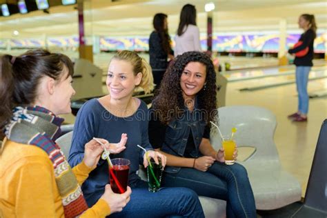 Friends on Funny Conversation Stock Photo - Image of news, bowling ...