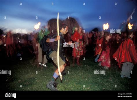 Druids dancing during the summer solstice at Avebury stone circle Stock Photo - Alamy