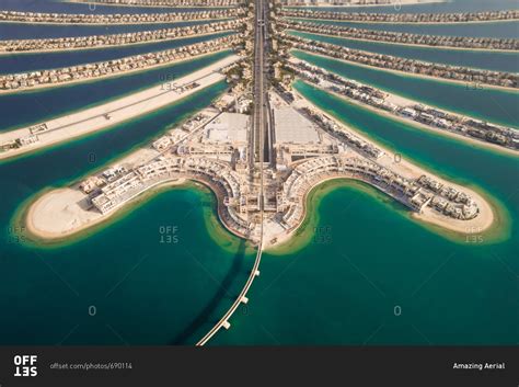 Aerial view of the Palm Jumeirah island in Dubai, U.A.E. stock photo - OFFSET