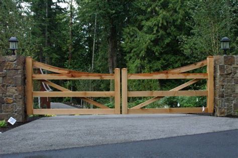 Custom, wood, ranch style vehicle gate #rustic #seattle #wood #swing #automated #ranch #gate # ...