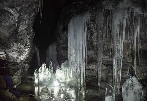 Ice formations in a Lava Tube. Crystal Cave at Lava Beds National Monument in Northern ...