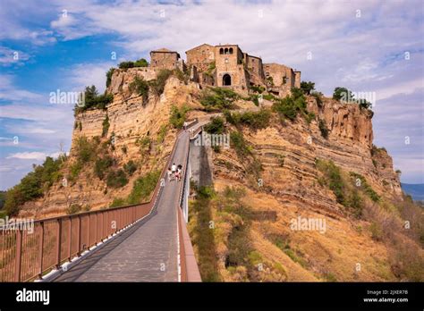 Ancient town of Bagnoregio, Italy. Old village on hill with a bridge Stock Photo - Alamy