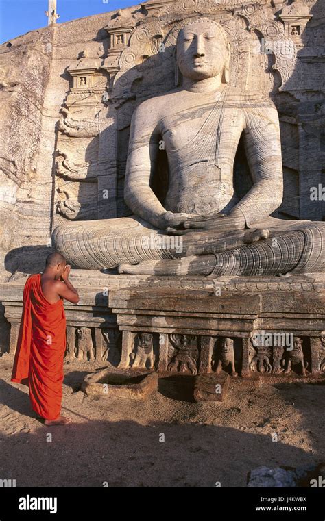 Sri Lanka, Polonnaruwa, Gal Vihara, Buddha's statue, monk, prayer, back ...