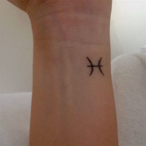 Pisces Tattoo on wrist! | Pisces tattoos, Pisces tattoo designs, Tattoos