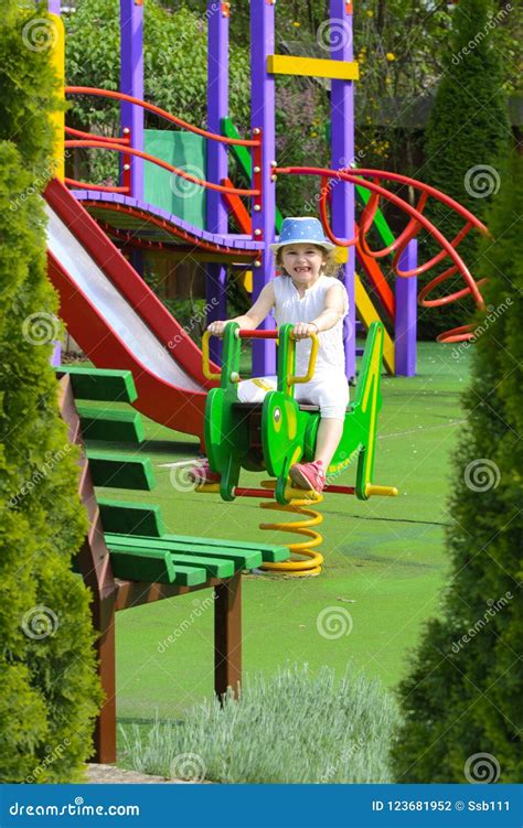 Little Children Run Around and Play in the Playground. Game Cent Stock ...