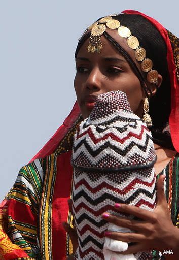 Africa | Woman holding a beaded vessel. Djibouti | ©unknown | African beauty, African people ...