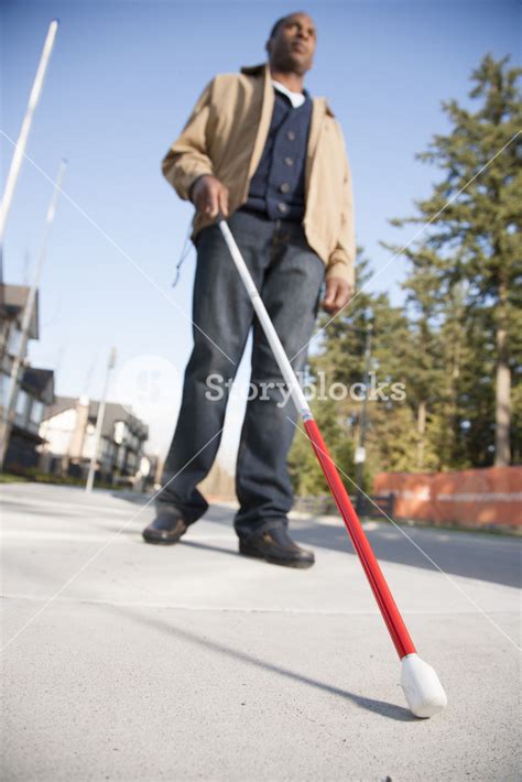 Blind man walking Royalty-Free Stock Image - Storyblocks