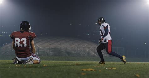 American football players in action 12719088 Stock Photo at Vecteezy