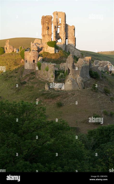 The great rugged ruins of an ancient Norman fortress dominate a strategic pass in the Purbeck ...