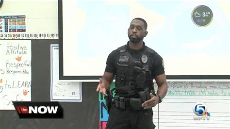 Delray Beach police officers speak to children at school