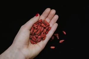 Dried saulty Pumpkin Seeds above black background - Creative Commons Bilder