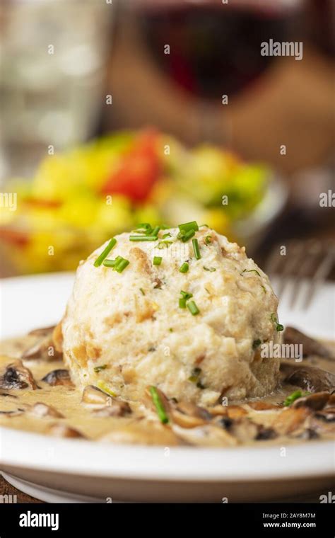 Bavarian bread dumplings with mushroom sauce Stock Photo - Alamy