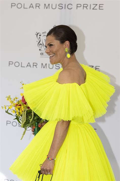 Crown Princess Victoria of Sweden wears neon yellow dress from H&M - pictures | Express.co.uk