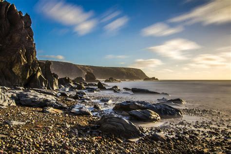 Scenic View of Sea Against Dramatic Sky · Free Stock Photo