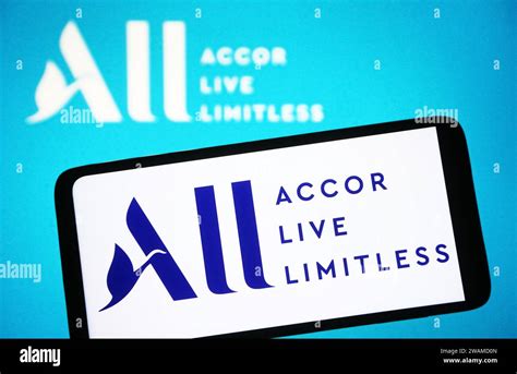 In this photo illustration, Accor Live Limitless (ALL) logo is seen on a smartphone and in the ...