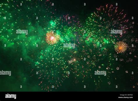 Colorful fireworks against dark sky Stock Photo - Alamy