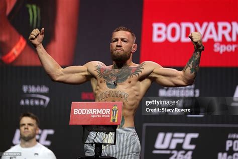 Conor McGregor poses during a ceremonial weigh in for UFC 264 at ...