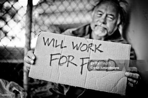 Homeless Man With Sign High-Res Stock Photo - Getty Images