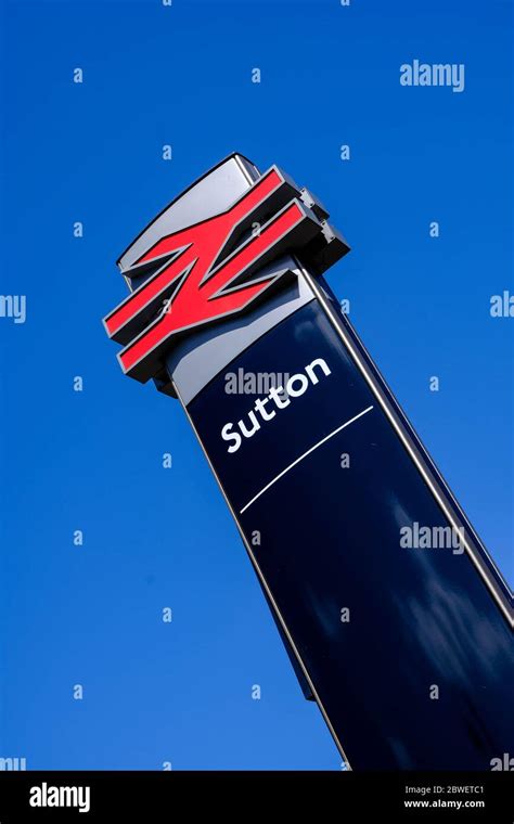 Sutton Railway Station Sign In South London Stock Photo - Alamy