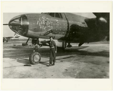 One-half front left view of the Martin B-26 Marauder "Flak Bait" parked on the ground, on the ...