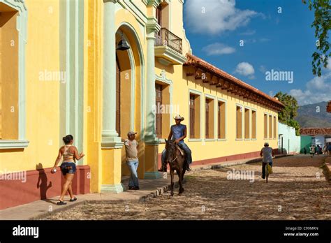 Colorful street scene from Trinidad Stock Photo - Alamy