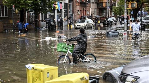 New York floods: Basement rescues spark climate change concerns - BBC News