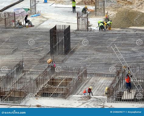 Construction Workers Install Reinforcement Bars at the Construction ...