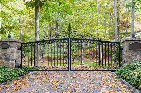 Gorgeous custom swirl and scrollwork for a wrought-iron driveway gate ...