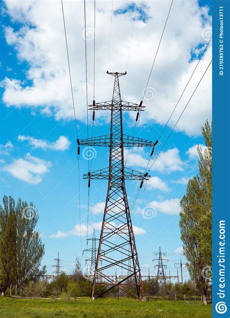 The Silhouette of the Power Line Against the Blue Sky. Stock Image - Image of pole, plant: 219289763