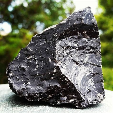 Obsidian is a naturally occurring volcanic glass formed as an extrusive ...