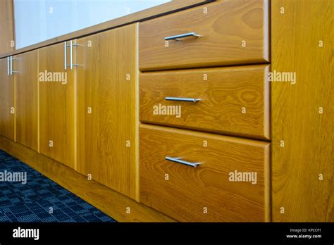 design of teak wood drawer in an office Stock Photo - Alamy