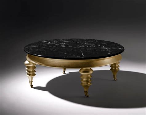 Rolling Gold Round Coffee Table with Black Marble Top and Gold Detailing For Sale at 1stdibs