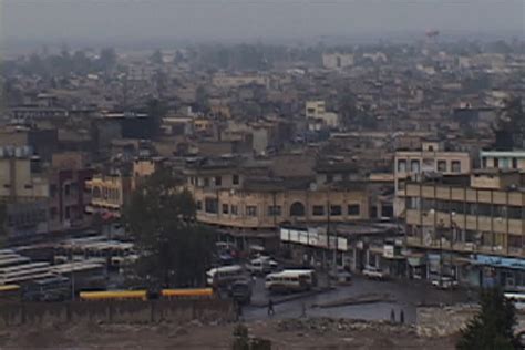 View Of The Ancient City Of Kirkuk Under A Big, Cloud-filled Sky In ...