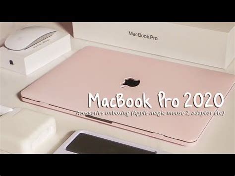 an apple macbook pro is sitting on a table next to other electronic ...