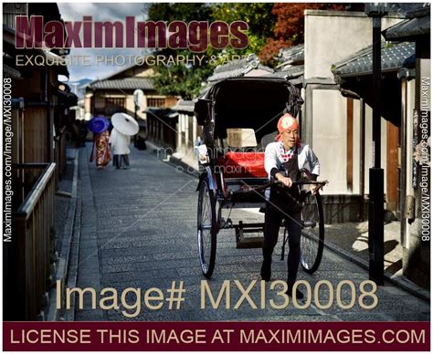 Photo of Japanese rickshaw on an old street in Kyoto Japan | Stock ...