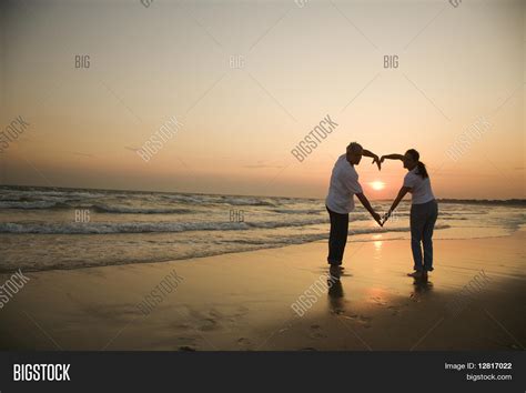 Mid-adult Couple Making Heart Shape Image & Photo | Bigstock