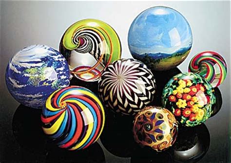 Handmade marbles on display - Toledo Blade