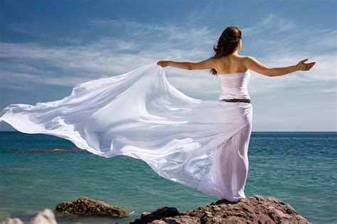 Feel The Breeze, rock, ocean, wind, breeze, bonito, sky, woman, girl, summer, HD wallpaper | Peakpx