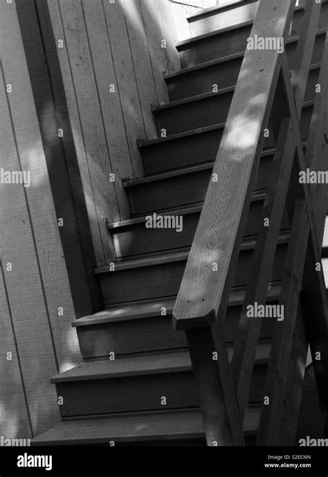 Walking up a flight of old wooden stairs. USA, America Stock Photo - Alamy