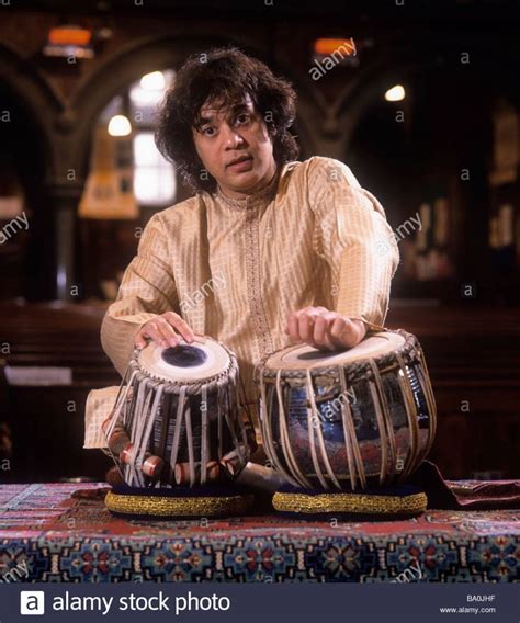 Indian musician Zakir Hussain, playing tabla, in London Stock Photo ...