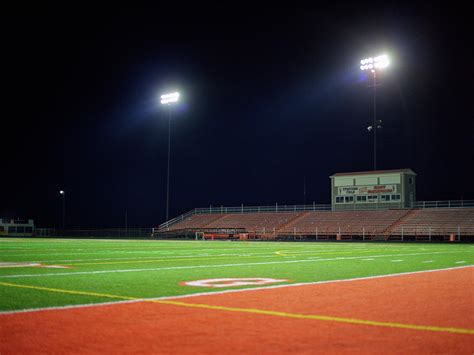 Empty American Football Field, Night by Darrin Klimek